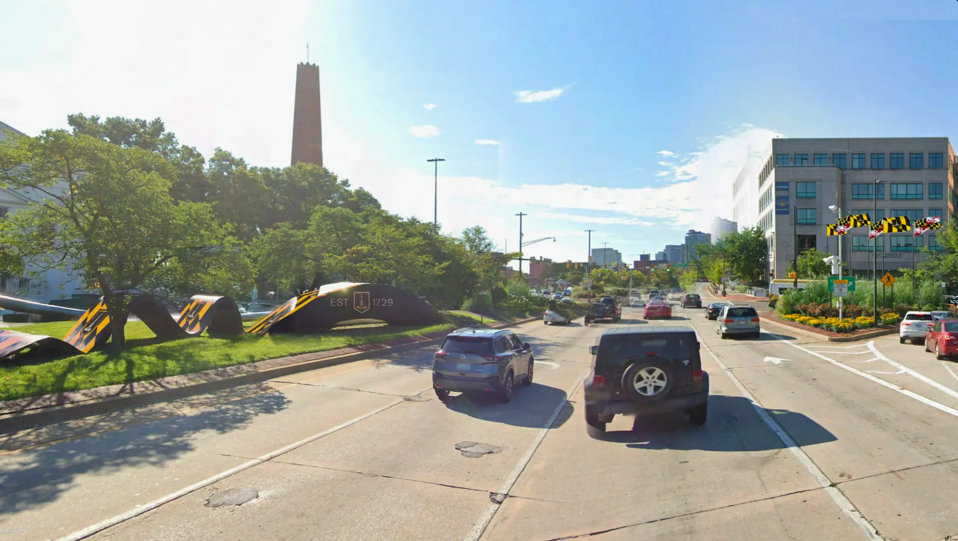 Concept rendering of the President Street gateway with Maryland flag ribbon sculptures and an EST. 1729 marker